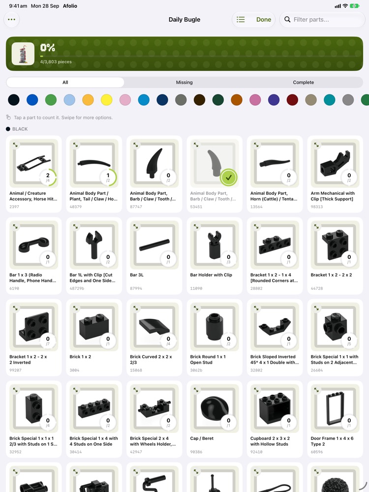 Full-screen parts checklist on iPad for the Daily Bugle, with a six-column grid of parts, colour filters and a progress banner